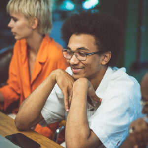 cinematic image of people working in a start up business. Multiethnic team of experts working together to develop the new projects