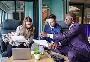 Business people in the workplace are discussing a working strategy for doing business